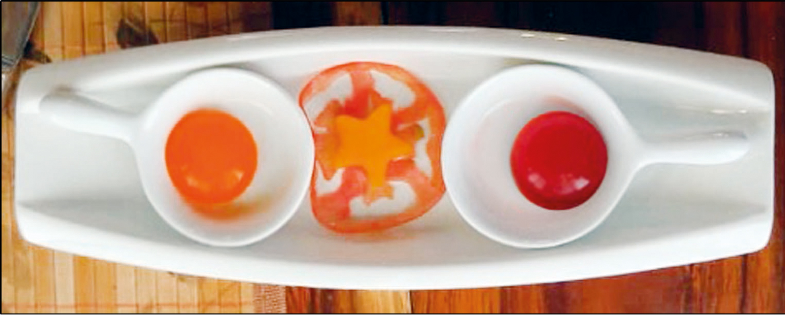 Cócteles daiquirí de mango (a la izquierda) y cubanito (a la derecha) esferificados por metodología inversa